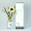 Ronde fles riet diffuser met boeketbloemen
